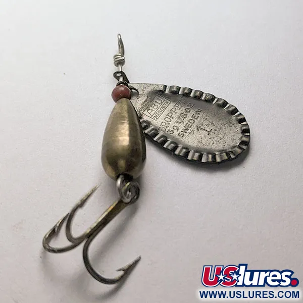 Abu Garcia Abu Swangsta Droppen 1, 4g, ottone/nero, Cucchiaino rotante #22187